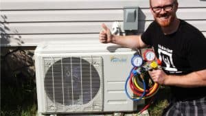 mini split ac installation thumbs up with manifold